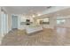 Beautiful open kitchen boasts stainless appliances, center island, and access to other rooms at 51 Webb St, Osprey, FL 34229