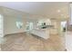 Open floor plan kitchen featuring stainless steel appliances, and backyard views at 51 Webb St, Osprey, FL 34229