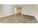 Spacious living room featuring modern flooring and bright, neutral walls at 51 Webb St, Osprey, FL 34229