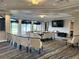 Spacious conference room for large meetings with TV and views to outside at 5220 Hyland Hills Ave # 1211, Sarasota, FL 34241