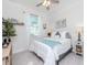 Cozy bedroom with large window and natural light and closet space at 5277 Grove Mill Loop, Bradenton, FL 34211