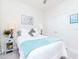 Bright bedroom with closet space, offering comfort and style at 5277 Grove Mill Loop, Bradenton, FL 34211