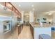 Modern kitchen features stainless steel appliances, granite countertops, and an open design at 5577 Palmer Cir # 203, Bradenton, FL 34211