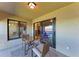 Inviting outdoor patio with seating, perfect for enjoying meals with a view of the surrounding landscape at 5577 Palmer Cir # 203, Bradenton, FL 34211
