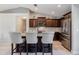 Well-equipped kitchen features stainless steel appliances, modern backsplash, and ample counter space at 5757 Jonesboro Ave, North Port, FL 34288