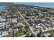 Aerial view of the area showcasing residential homes nestled amongst lush landscaping near the beautiful Florida coast at 640 Fox St, Longboat Key, FL 34228