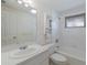 Bathroom with a single sink vanity, shower and tub at 640 Fox St, Longboat Key, FL 34228