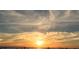 Golden sunset over the ocean, creating a vibrant and stunning backdrop for a peaceful beach scene at 640 Fox St, Longboat Key, FL 34228