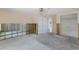 Bedroom with a ceiling fan, closet and attached bath at 640 Fox St, Longboat Key, FL 34228