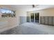 Bedroom with a ceiling fan, and sliding glass doors leading to the yard at 640 Fox St, Longboat Key, FL 34228