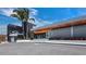 Stylish building exterior featuring modern architecture, a valet stand, and a well-maintained landscape at 640 Fox St, Longboat Key, FL 34228