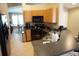 Functional kitchen features black appliances, wood cabinets, and bar seating at 6709 Rock Bridge Ln, Ellenton, FL 34222
