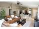 Spacious open concept living area with tile flooring and a view of the kitchen at 6709 Rock Bridge Ln, Ellenton, FL 34222