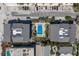 A birds eye view of the luxury condominium building and pool with pristine sandy beach in the background at 6804 Gulf Dr # 6804, Holmes Beach, FL 34217