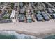 Aerial view of condos, beach, and community showing close proximity to the beach at 6804 Gulf Dr # 6804, Holmes Beach, FL 34217