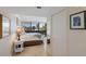 Bedroom featuring tile floors and sliding doors to the outdoor balcony at 6804 Gulf Dr # 6804, Holmes Beach, FL 34217