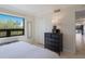Bedroom with dresser and ample light at 6804 Gulf Dr # 6804, Holmes Beach, FL 34217