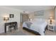 Comfortable bedroom showcasing tile floors and light, neutral colors at 6804 Gulf Dr # 6804, Holmes Beach, FL 34217