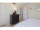 Comfortable bedroom with dark dresser and ample closet space at 6804 Gulf Dr # 6804, Holmes Beach, FL 34217