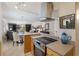 Kitchen area showcasing stainless appliances, range top and open floorplan at 6804 Gulf Dr # 6804, Holmes Beach, FL 34217