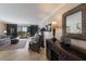 Cozy living room with comfortable seating and a view of the balcony and the ocean at 6804 Gulf Dr # 6804, Holmes Beach, FL 34217