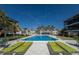Enjoy the community pool with lounge chairs in an attractive setting and close to multiple buildings at 6804 Gulf Dr # 6804, Holmes Beach, FL 34217