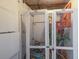 Community lockers with secure wire mesh doors offering convenient storage for beach gear and accessories at 6804 Gulf Dr # 6804, Holmes Beach, FL 34217