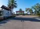 Attractive community entrance with stone pillars and a gated entry at 7095 Tamworth Pkwy, Sarasota, FL 34241
