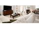 Bright living room with modern furniture, recessed lighting, and neutral decor at 7095 Tamworth Pkwy, Sarasota, FL 34241