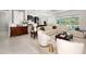 Open-concept living space with modern decor and ample seating at 7095 Tamworth Pkwy, Sarasota, FL 34241