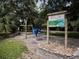 Informative sign at Lakeview Park displays the disc golf course map and park details at 7095 Tamworth Pkwy, Sarasota, FL 34241