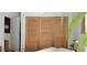 Bedroom showcasing a closet with three sliding doors at 722 S Blvd Of The Presidents # 201, Sarasota, FL 34236