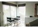 Bright dining area with large windows providing lots of natural light at 722 S Blvd Of The Presidents # 201, Sarasota, FL 34236