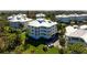 Aerial view of condos showing the lush landscaping and community at 7730 34Th W Ave # 103, Bradenton, FL 34209