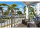 A cozy balcony provides a peaceful view of the community at 7730 34Th W Ave # 103, Bradenton, FL 34209