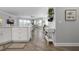 Open living space with an island, view of the living room, modern decor, and wood-style flooring at 7730 34Th W Ave # 103, Bradenton, FL 34209