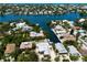 Gorgeous aerial view of a waterfront community with houses along canals leading to the Gulf at 807 S Bay Blvd, Anna Maria, FL 34216