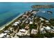 Breathtaking aerial view of waterfront community on the Gulf of Mexico with pristine beaches at 807 S Bay Blvd, Anna Maria, FL 34216