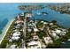 Gorgeous aerial view of an island community with boat docks and winding roads near pristine beaches and ocean at 807 S Bay Blvd, Anna Maria, FL 34216