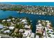 Waterfront community aerial view with beach access, canals, and houses along the water at 807 S Bay Blvd, Anna Maria, FL 34216