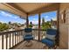 Balcony with blue chairs looking out at the water and other houses at 807 S Bay Blvd, Anna Maria, FL 34216