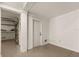 Clean garage with epoxy flooring, an electric door and a storage system at 807 S Bay Blvd, Anna Maria, FL 34216