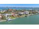 Beautiful aerial view of waterfront homes, canals, and scenic coastal landscape at 810 Siesta Dr, Sarasota, FL 34242