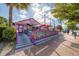 The Fudge Factory at Siesta Key Village with a whimsical exterior and inviting patio at 810 Siesta Dr, Sarasota, FL 34242