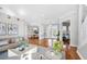Spacious living room with hardwood floors, modern decor, and an open layout at 810 Siesta Dr, Sarasota, FL 34242