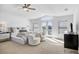 Bright main bedroom featuring balcony access, and a contemporary design at 810 Siesta Dr, Sarasota, FL 34242