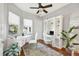 Bright home office with built in desk, ample storage, and exterior view at 810 Siesta Dr, Sarasota, FL 34242