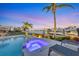 Backyard with pool, spa, and boat dock for a luxurious outdoor waterfront experience at 810 Siesta Dr, Sarasota, FL 34242