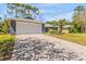 Charming single Gathering home with brick driveway, large garage, and lush landscaping at 820 Faulkwood Ct, Sarasota, FL 34232