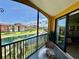 Relaxing balcony with a view of the community lake, perfect for enjoying the outdoors at 8351 38Th Street E Cir # 302, Sarasota, FL 34243